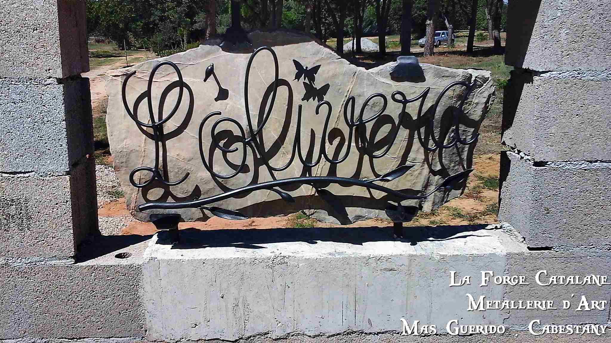 enseigne lotissement oliu saint cyprien forge catalane.jpg